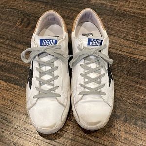 Golden Goose low star sneakers…white leather/black glitter star/tan heel trim.